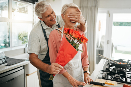 couple cooking in kitchen