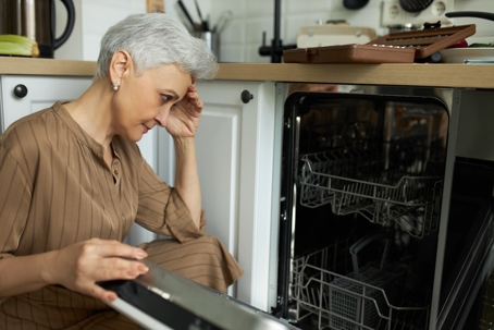 woman and dishwasher
